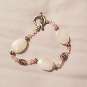 Pink beaded bracelet with pink gemstones